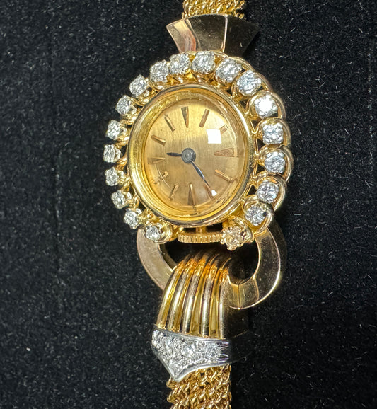 Rare montre 1950, or et diamants